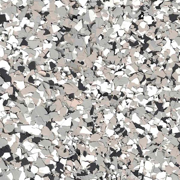 A close-up of a terrazzo surface with a mix of gray, white, and black speckled pattern, showcasing smooth, irregular shapes.